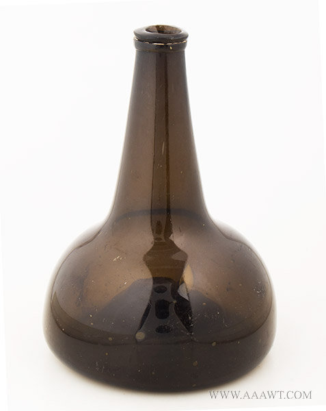 Blown Black Glass Wine Bottle, Horse Hoof, Onion with Pontil, String Lip
Dutch, Circa 1720, entire view